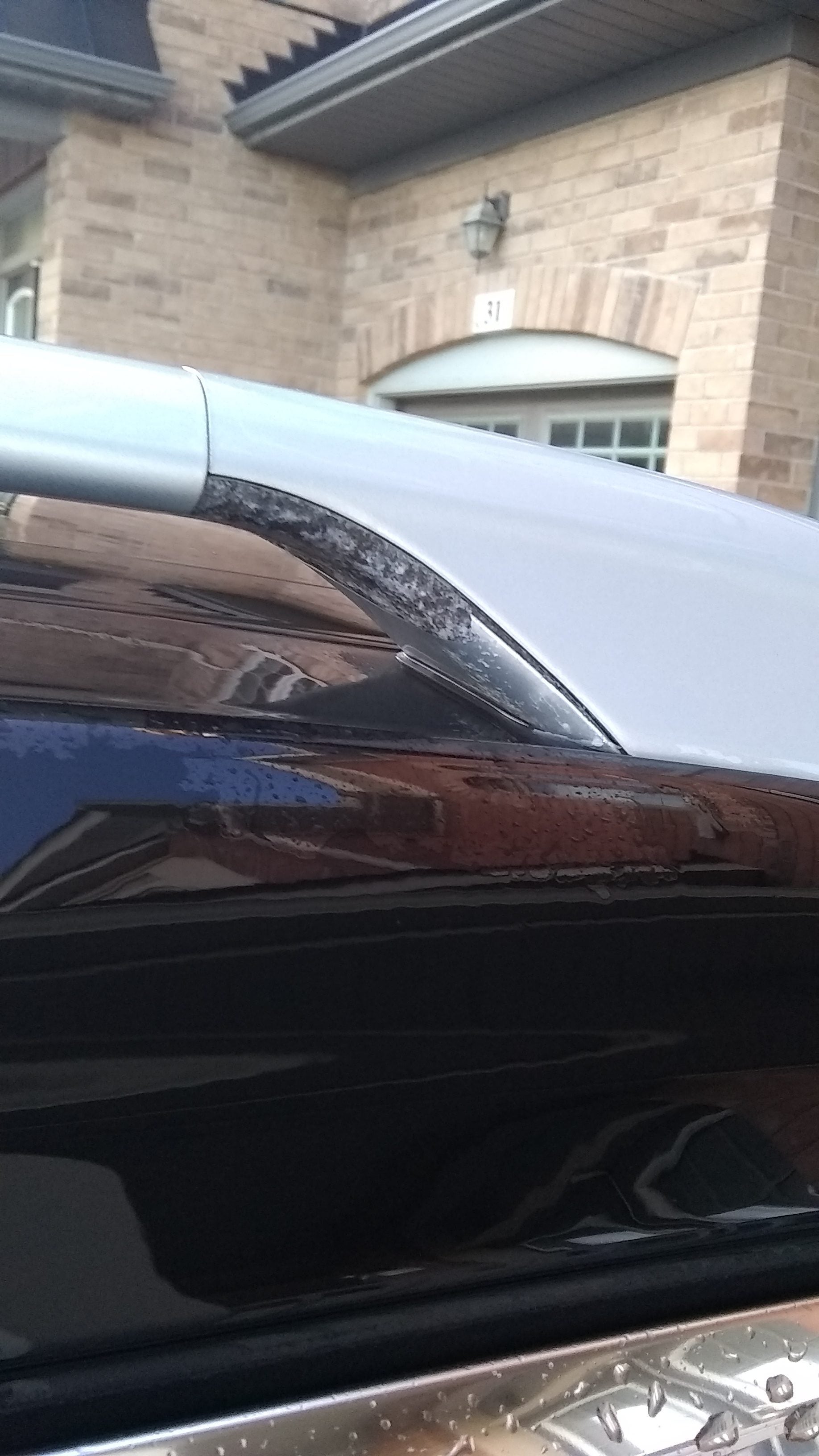 2014 Nissan Rogue - roof rail silver paint peeling off ...